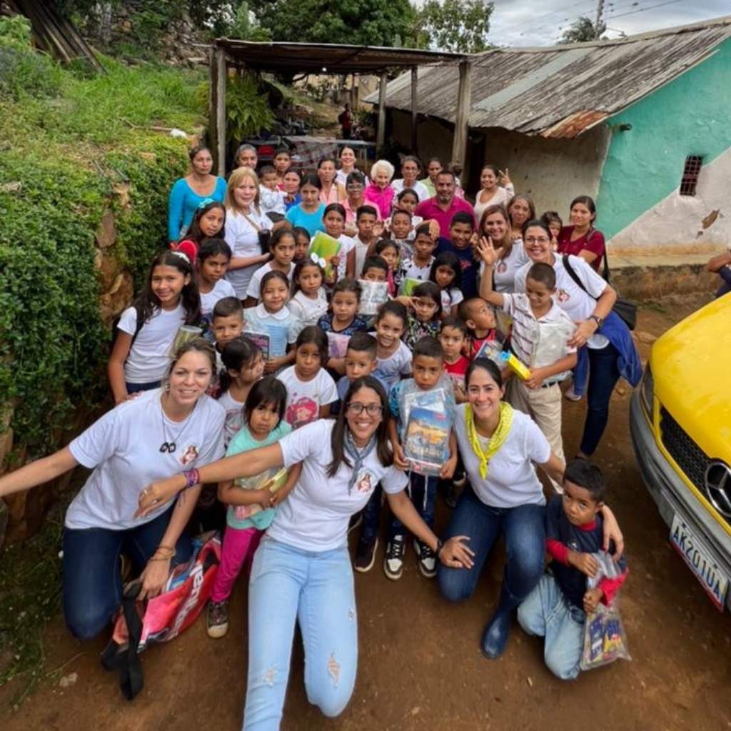 group of volunteer teachers and children