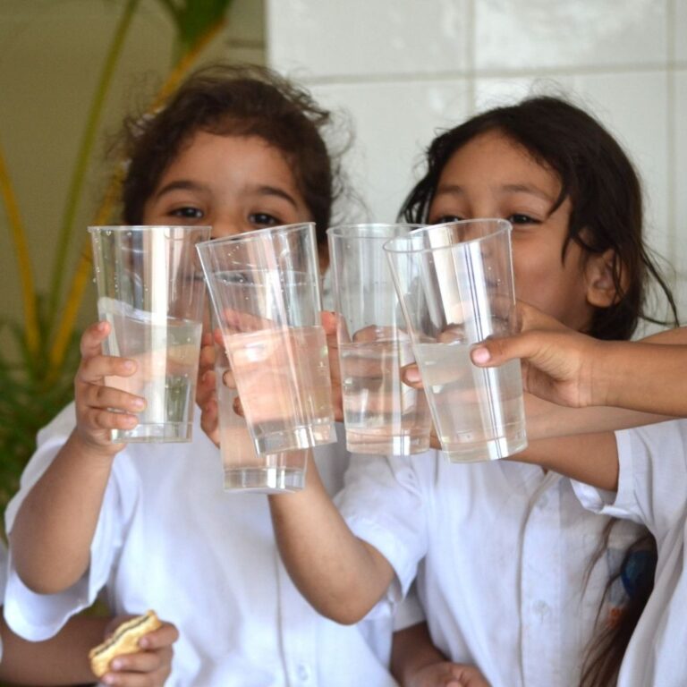 girls with glasses of water