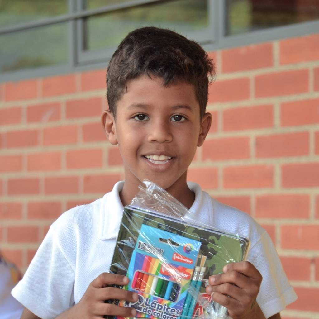 child with school supplies